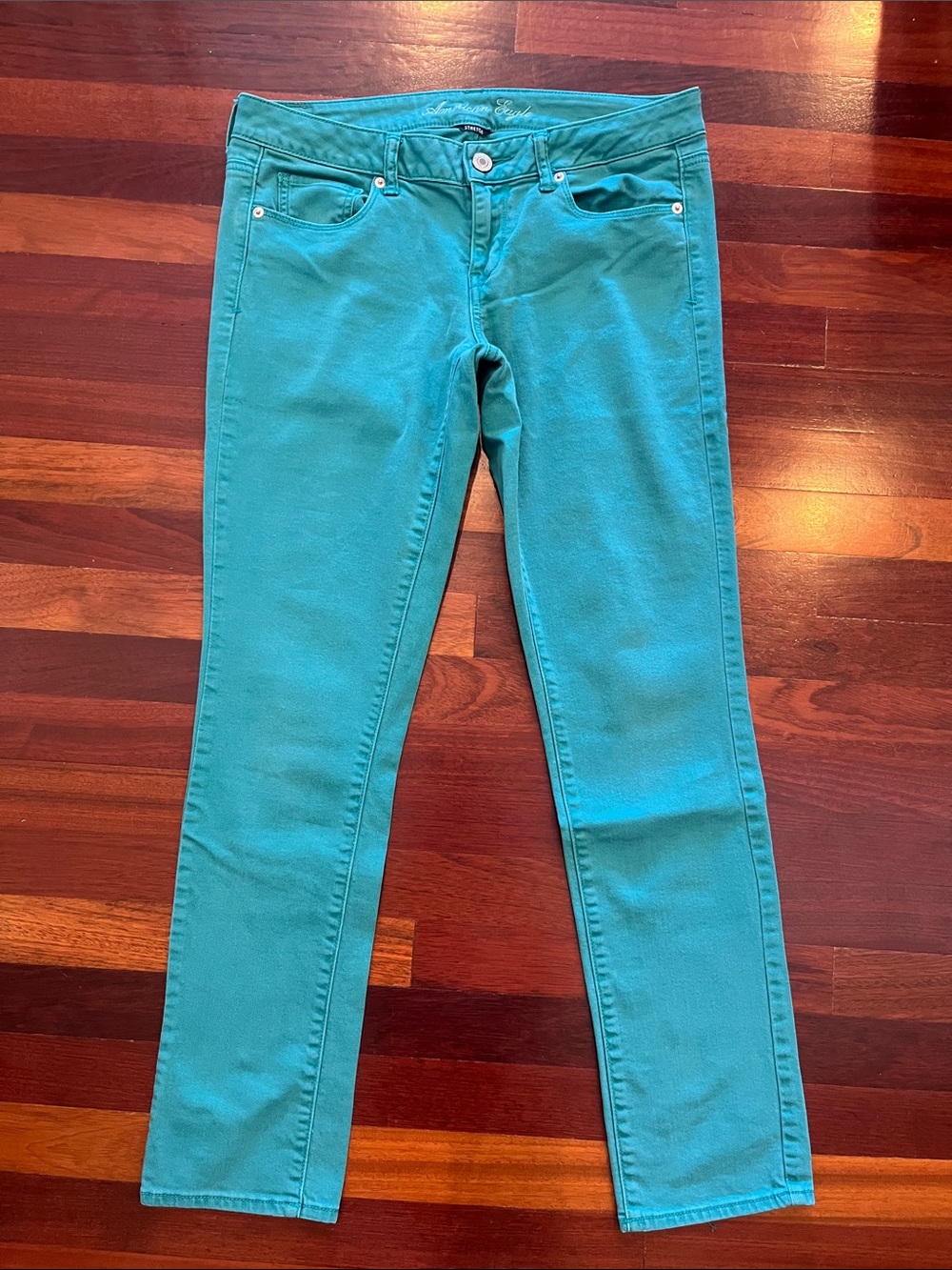 Womens 10 American Eagle Teal Skinny Stretch Jeans. perfect for summer.